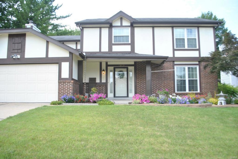 Lovely 2 story Tudor style home located in the hea