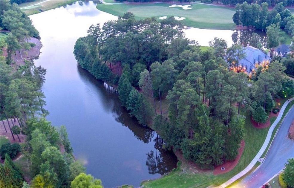 2+ Acre peninsula lot surrounded by 700 feet of la