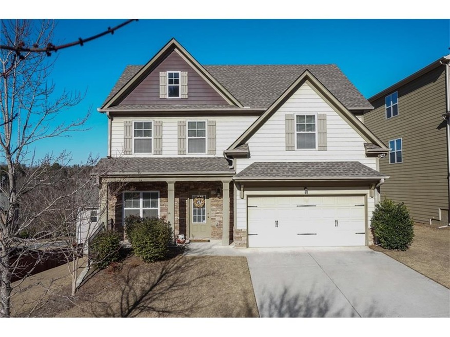 Craftsman style home features covered front porch 