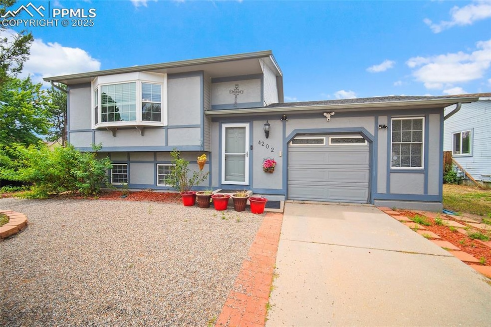 4202 Halstead Cir, Colorado Springs, CO 80916 - photo 1