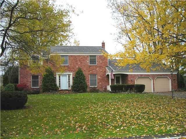 Exterior Front all brick colonial home with servic