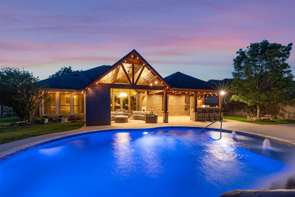 Welcome to this show-stopping, entertainer's paradise in Firethorne, situated on a sprawling 17,125 SF corner lot, boasting 4 bedrooms, 3.5 baths + 1 additional full outdoor bath, spread across a 3,694 SF single-story split floor-plan!