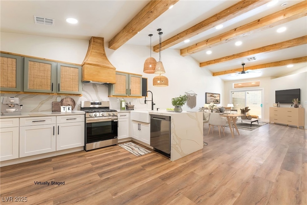 Kitchen featuring appliances with stainless steel