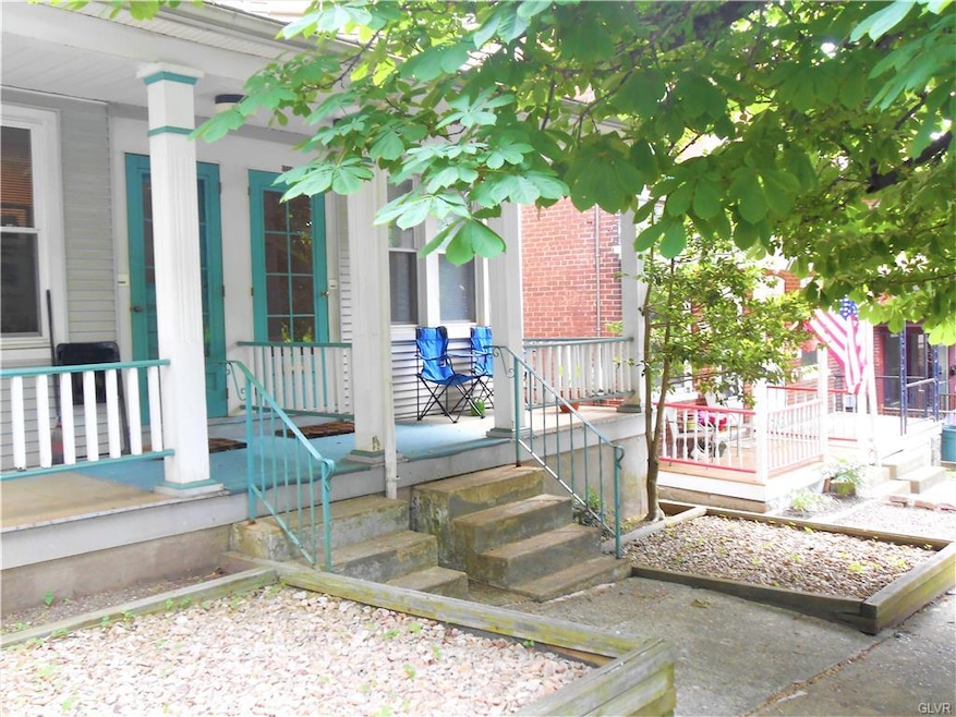 Front faade (right side) looking SW from street.