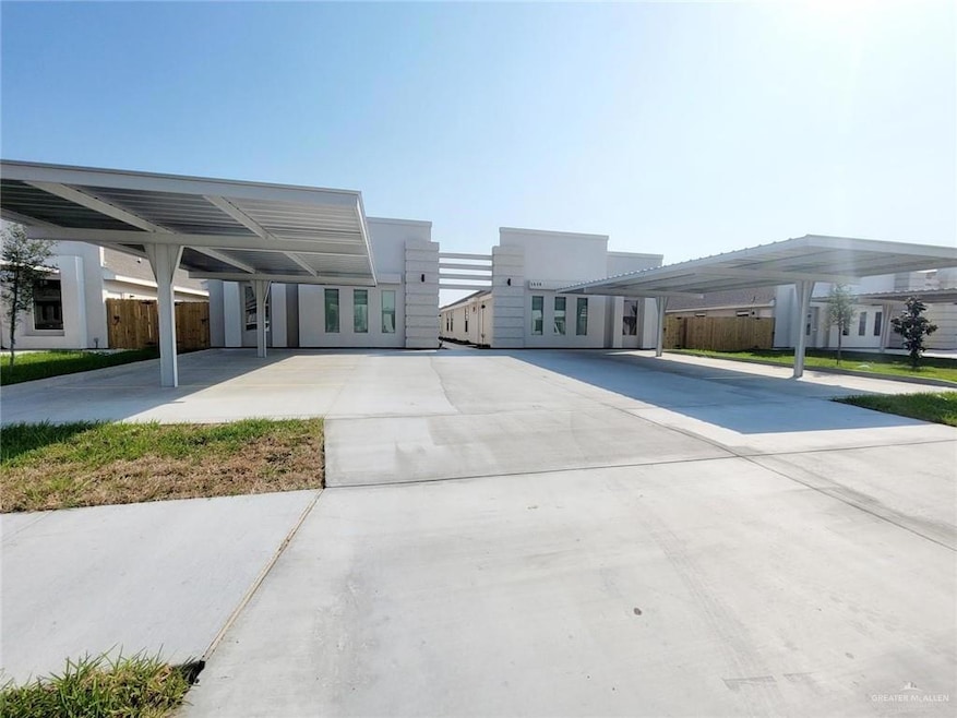 Modern home with a carport and concrete driveway