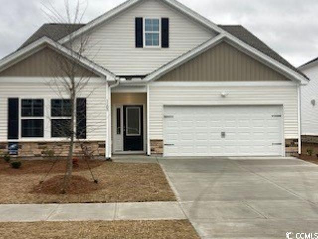 Craftsman-style house with an attached garage and 