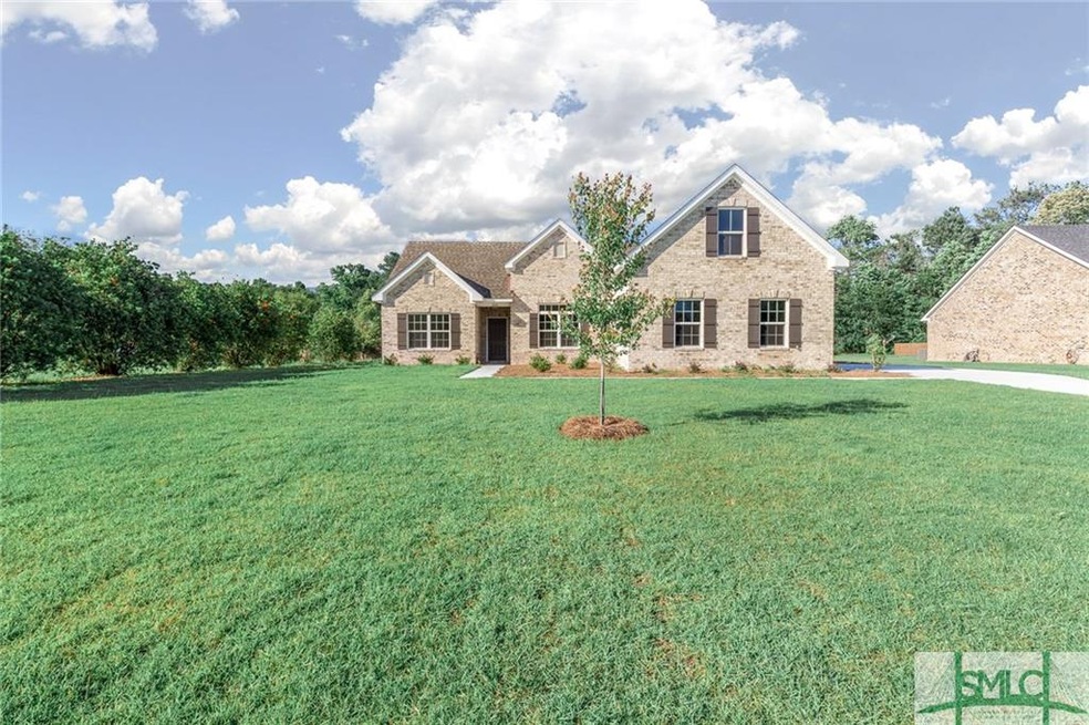 Beautiful BRICK home on large .79 acre lot.