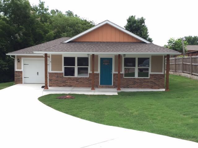 Front View, Master suite has deck over looking the