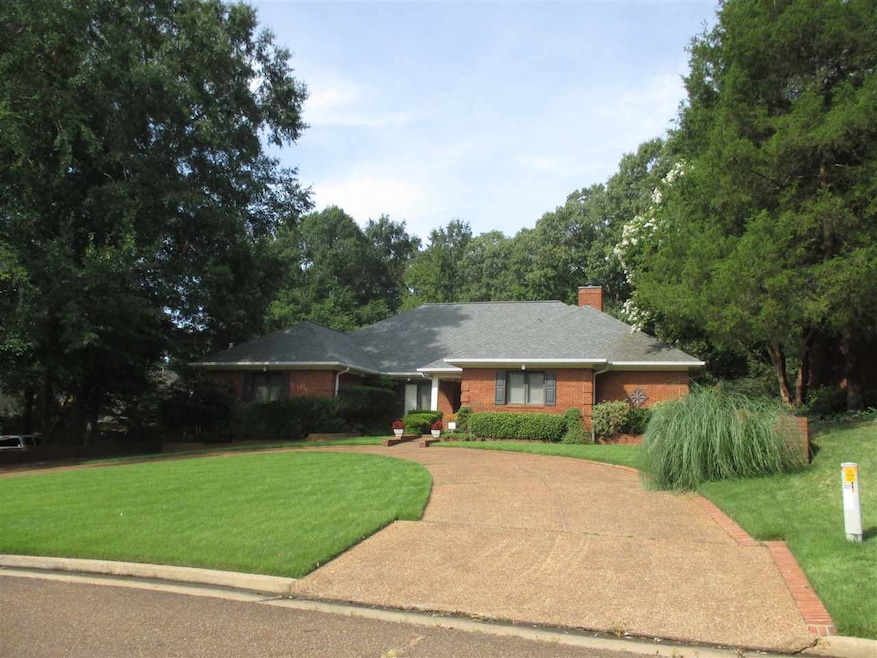 Circular drive provides ample parking for guests.