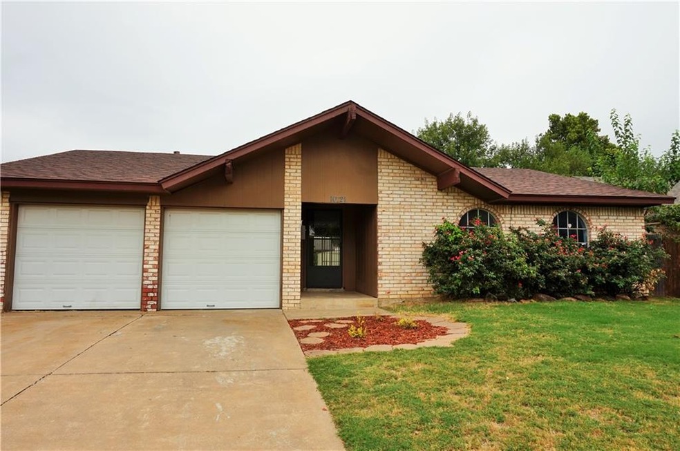 Cute brick home with Spanish style influence. Two 