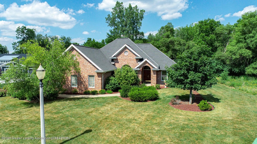 4116 Harbour Cove unit 4, Lansing, MI 48911 - photo 1