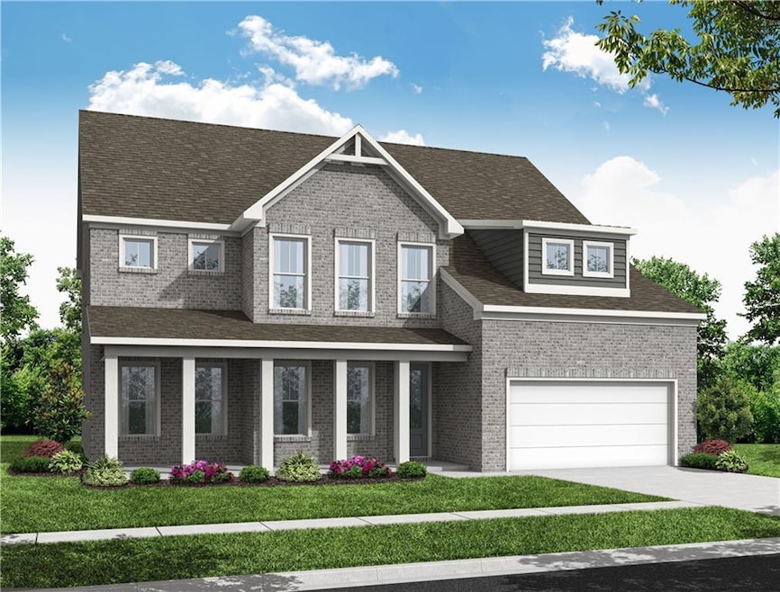 Craftsman house with driveway, brick siding, a front lawn, an attached garage, and roof with shingles