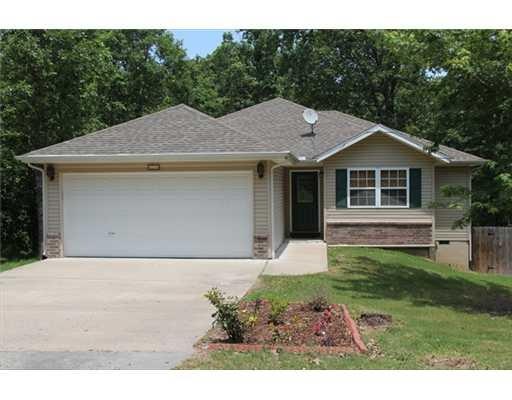 Exterior Front. Level front Yard & drive way.