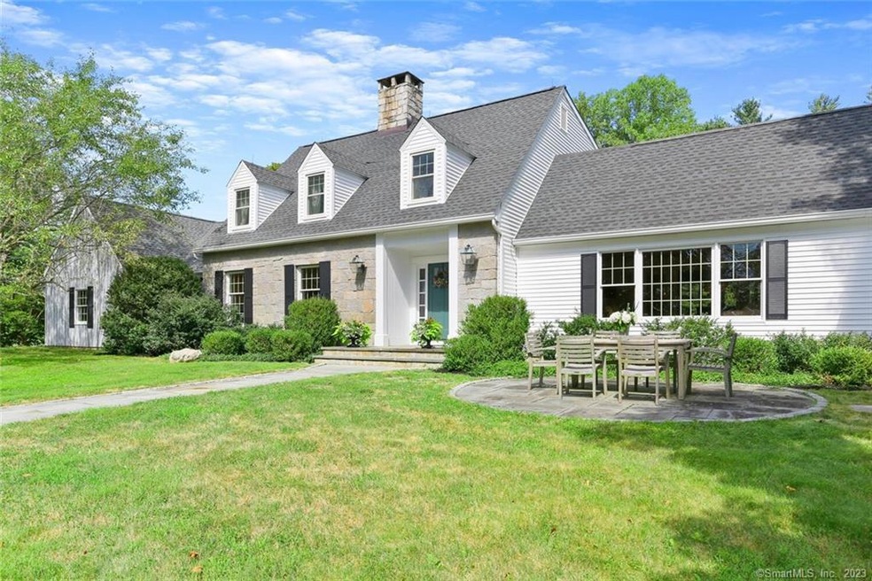 Amazing curb appeal and front patio for dining and