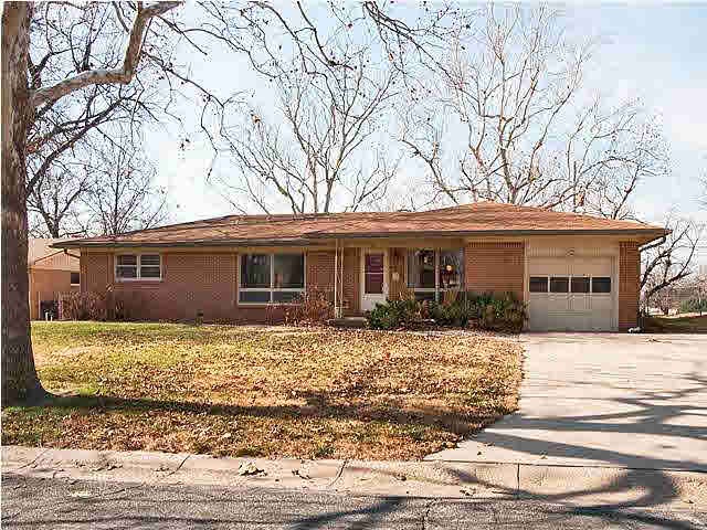 Full brick ranch tucked in Westlink Village.