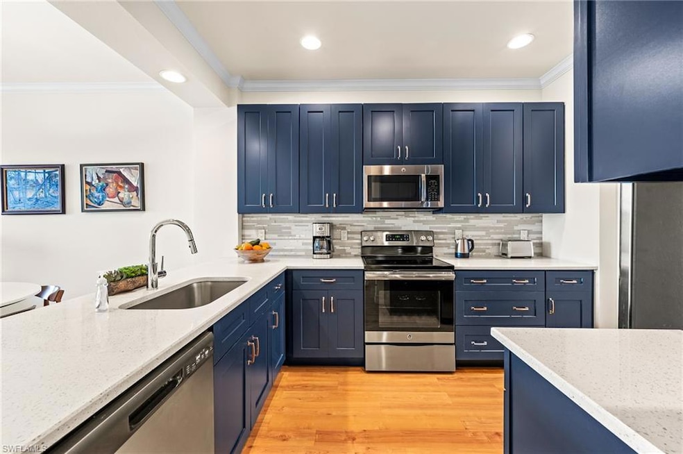 Kitchen featuring appliances with stainless steel 