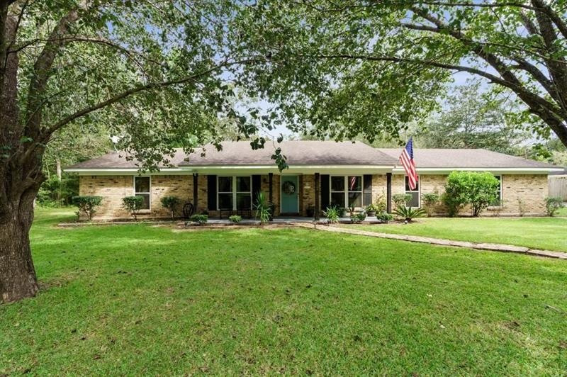 one story brick home on over two flat acres
