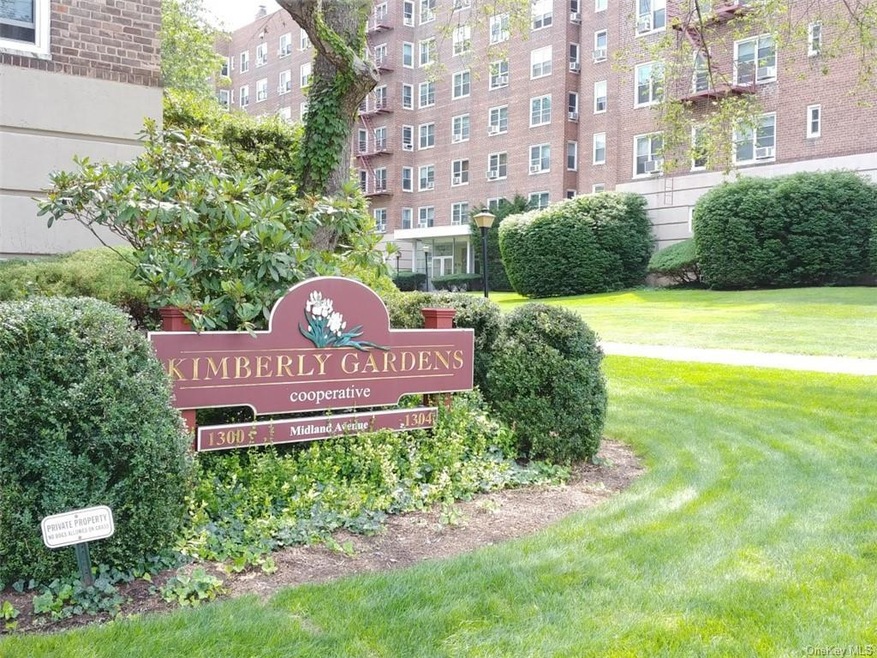 Front entrance to 1304 Midland Ave. with seasonal 