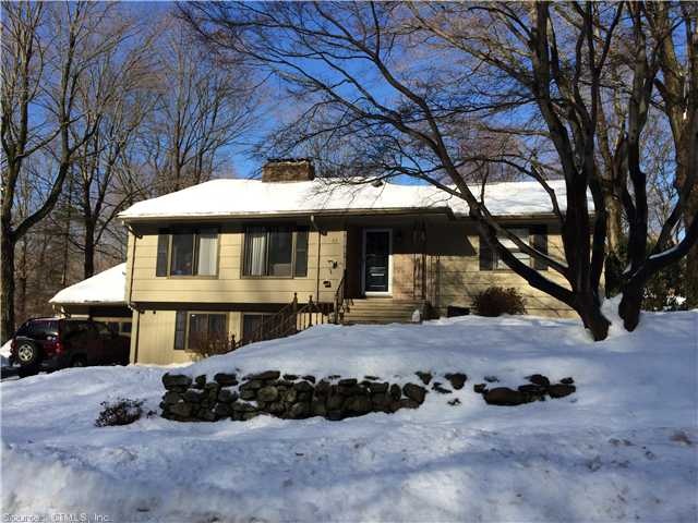 Exterior Front. Corner lot with large side yard an