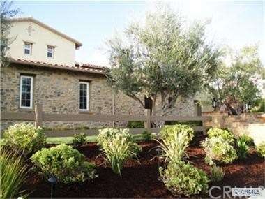 Meticulous professional landscaping. with large fr