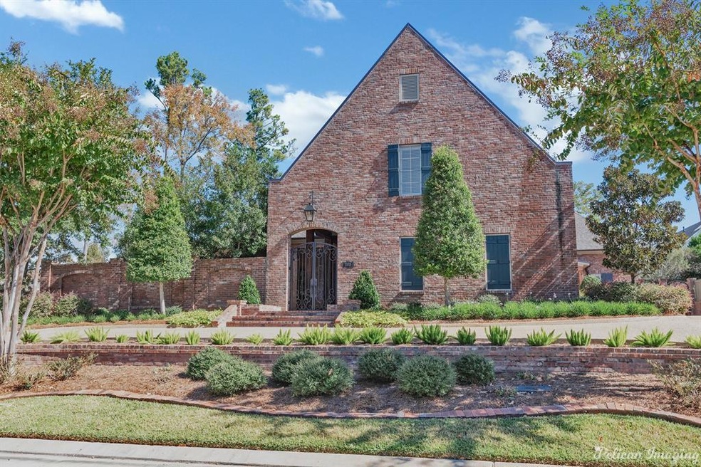 Front exterior with circle driveway
