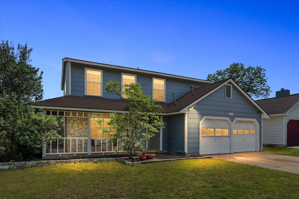 Traditional-style home featuring a front lawn, co