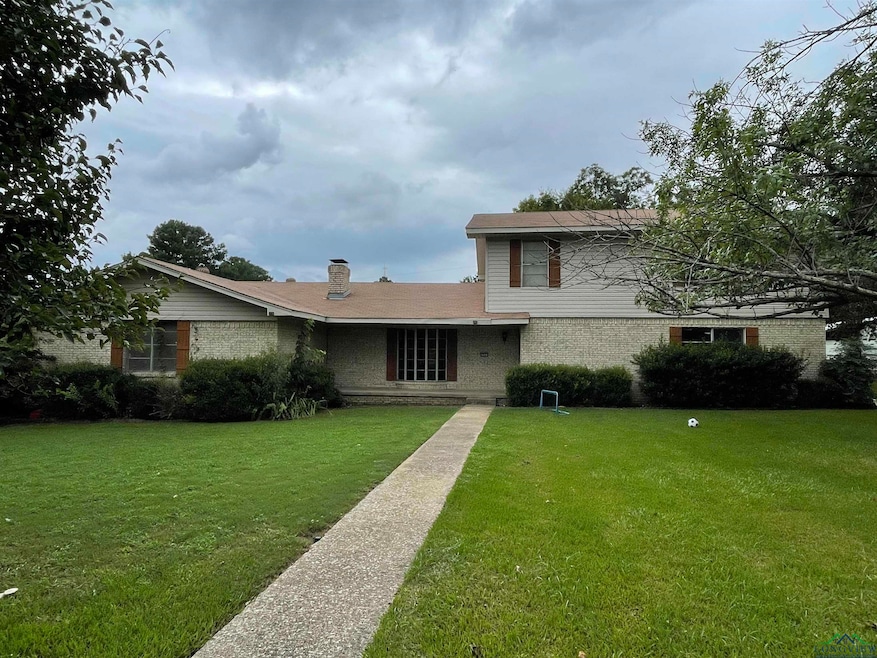 View of front of home with a front lawn