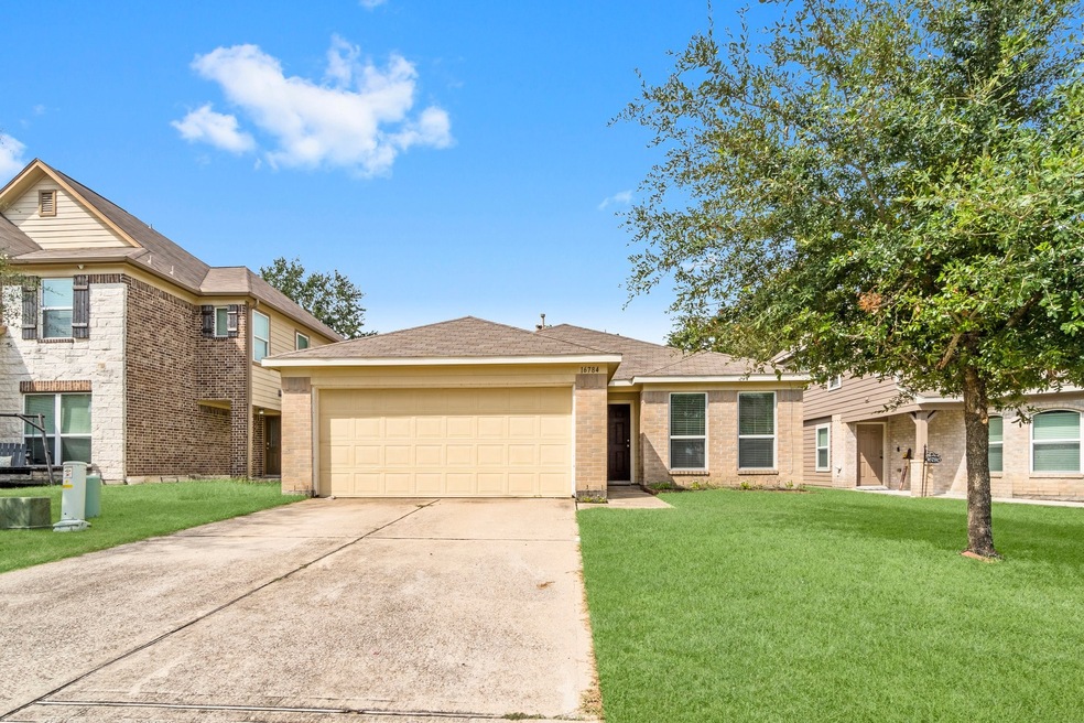 16784 Northern Flicker Trail, Conroe, TX 77385 - photo 1
