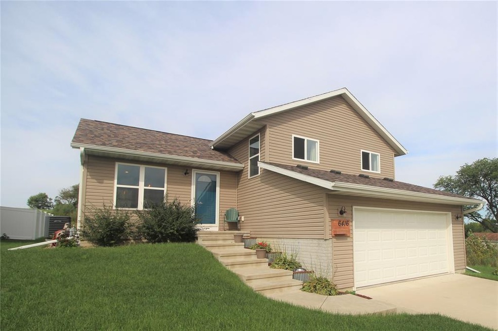 Front of home. 2-stall garage
