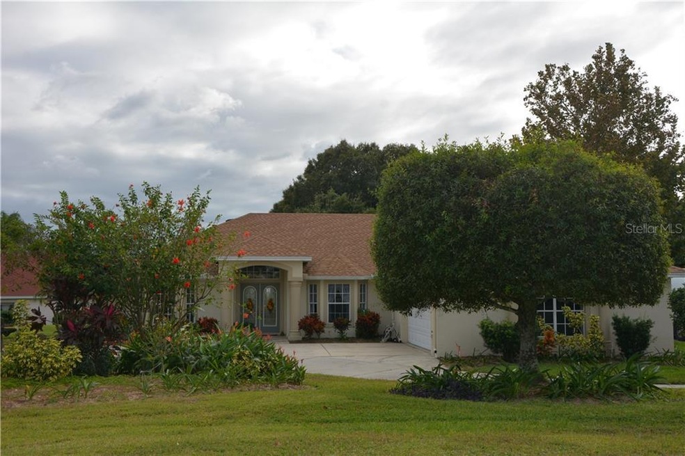 EXTERIOR FRONT STREET VIEW WITH MATURE LANDSCAPING
