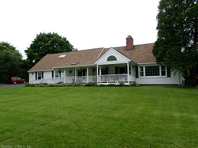 Exterior Front. Country living in this unique home