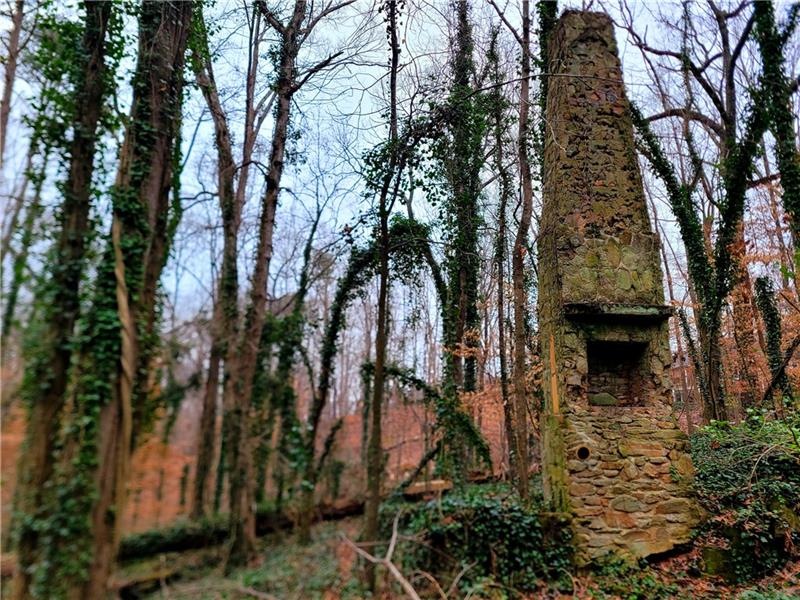 Old brick foundation and fireplace on the land mak