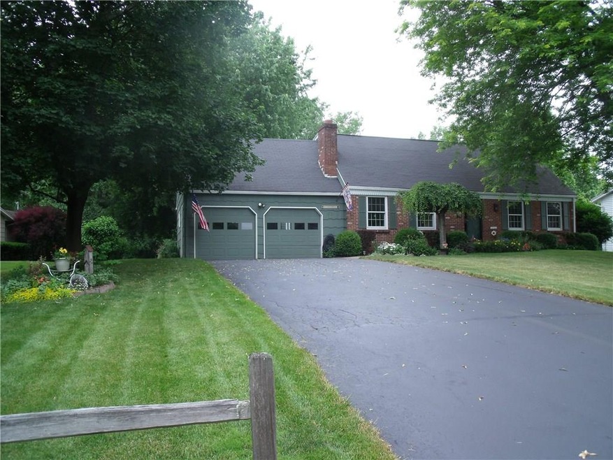 Brick and cedar shake exterior.