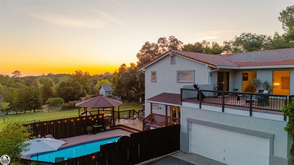 Balcony patio on top of garage with private access from the master bedroom