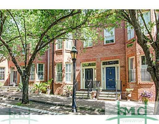 Exterior Front. c. 1892  brick row house in quiet 