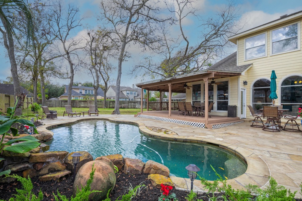 This pleasant home is located in Greatwood's Fairv