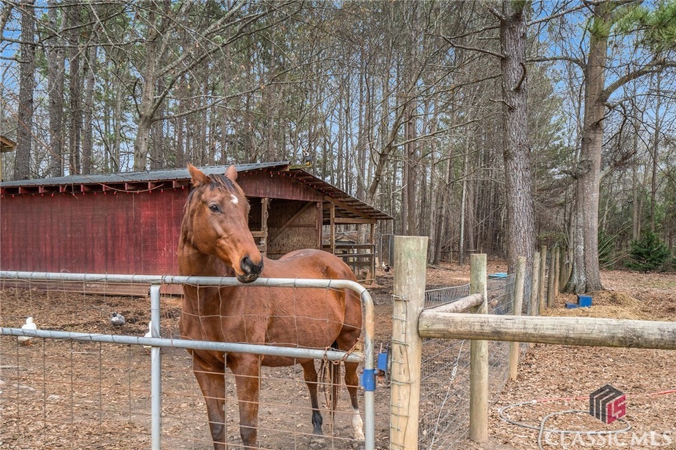 1061 Treadwell Bridge Rd, Statham, GA 30666 - photo 1