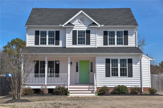 Welcome Home!  Lovely front porch and fresh mulch 