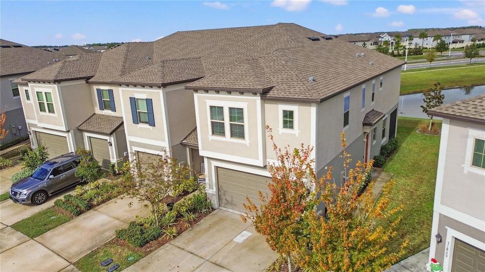 31865 Blue Passing Loop, Wesley Chapel, FL 33545 - photo 1