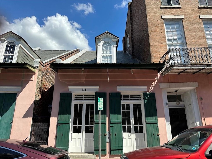 416 Burgundy #1 is the front of a twin creole cott