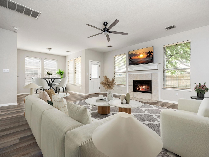 Living room with plenty of natural light, a tile 