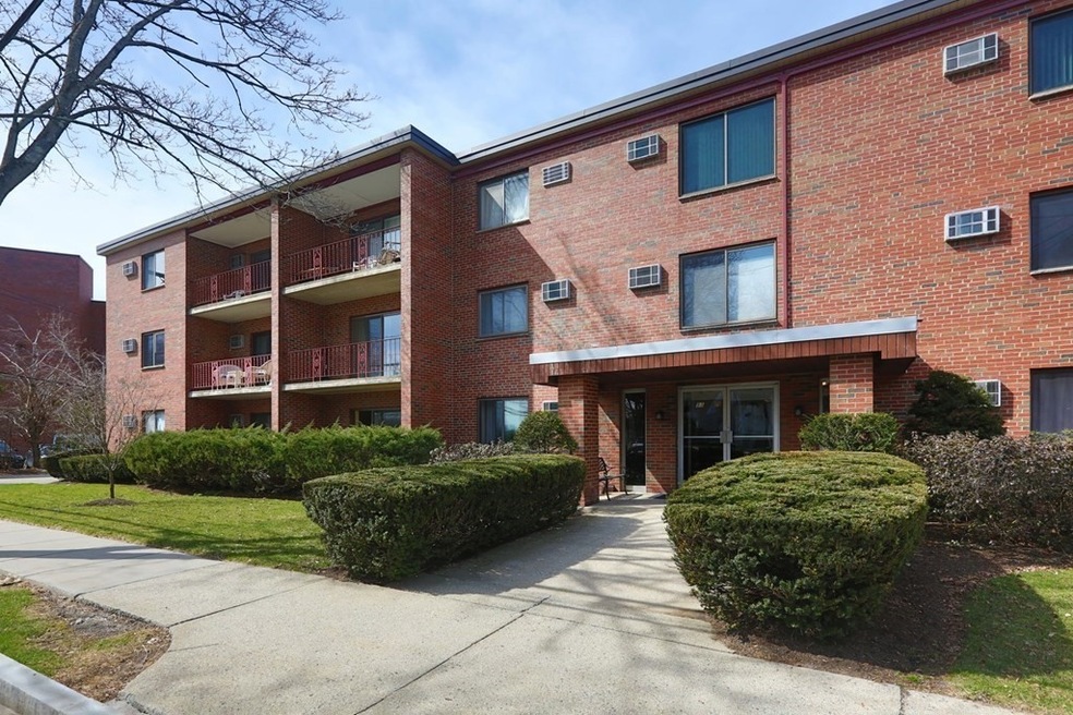 53 Paul St unit 24, Newton Center, MA 02459 - photo 1