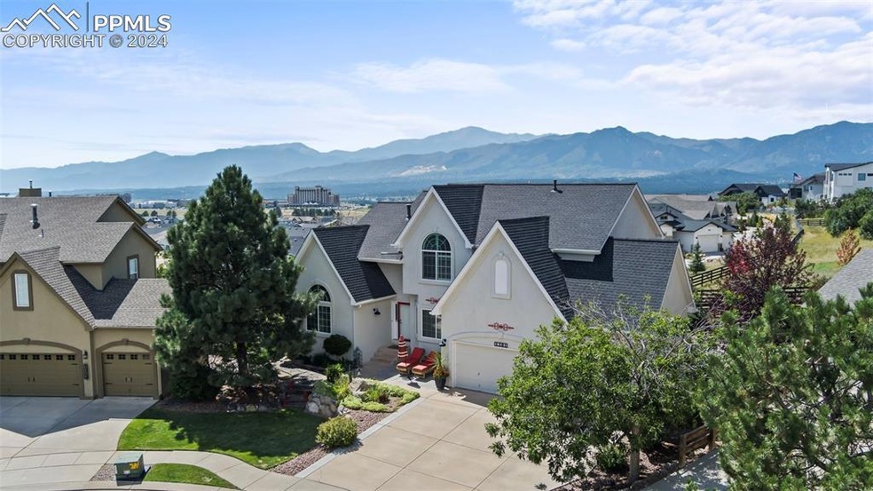 View of front of property with a mountain view and