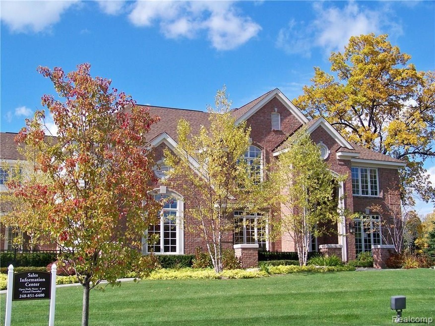 Beautiful exterior with lush landscaping.