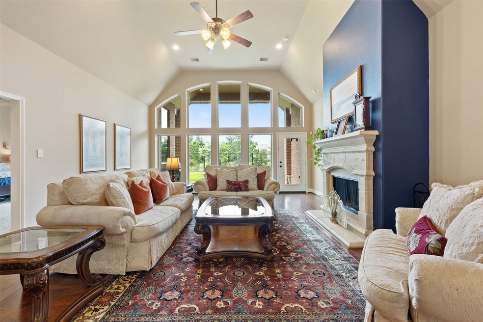 Welcome home to this stunning single-story Perry Homes design, located on a premier waterfront lot in the highly-desired Master Planned community of Southern Trails.