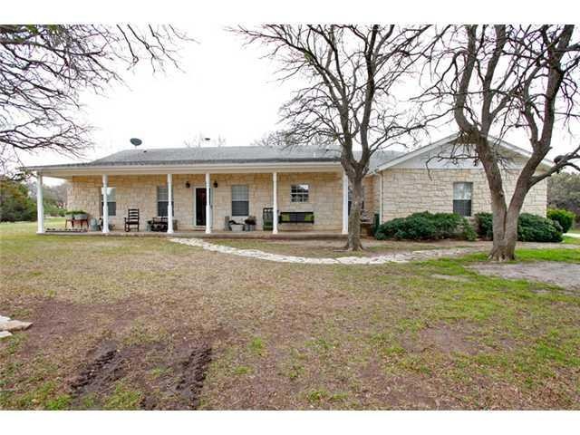 Exterior Front : 206 Graystone sits on a gorgeous 3.4 acre lot in Georgetown TX