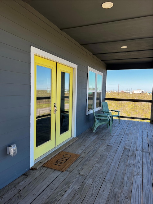 Wooden terrace with french doors