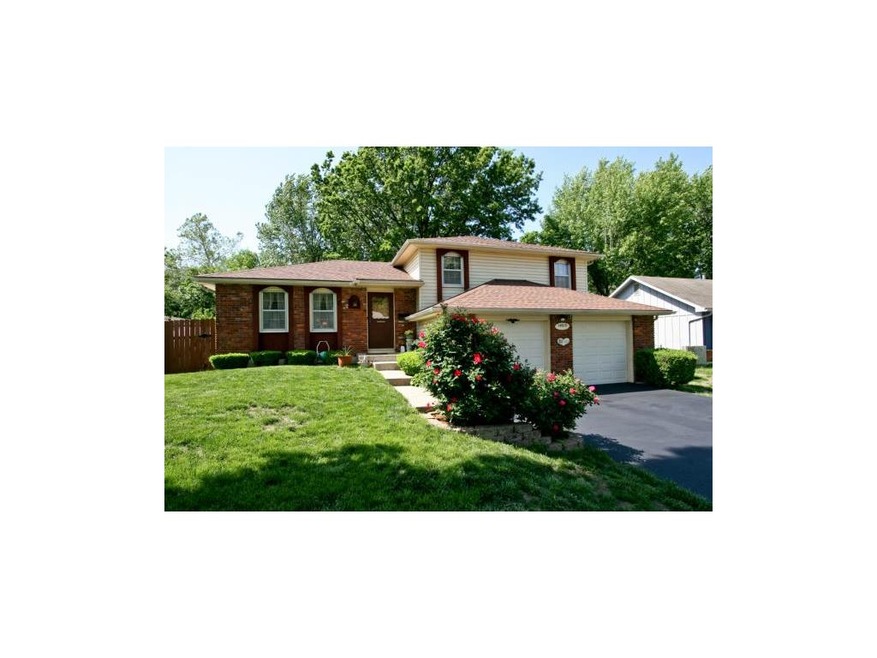 Front Exterior: Brick Trim and Vinyl Siding Over A