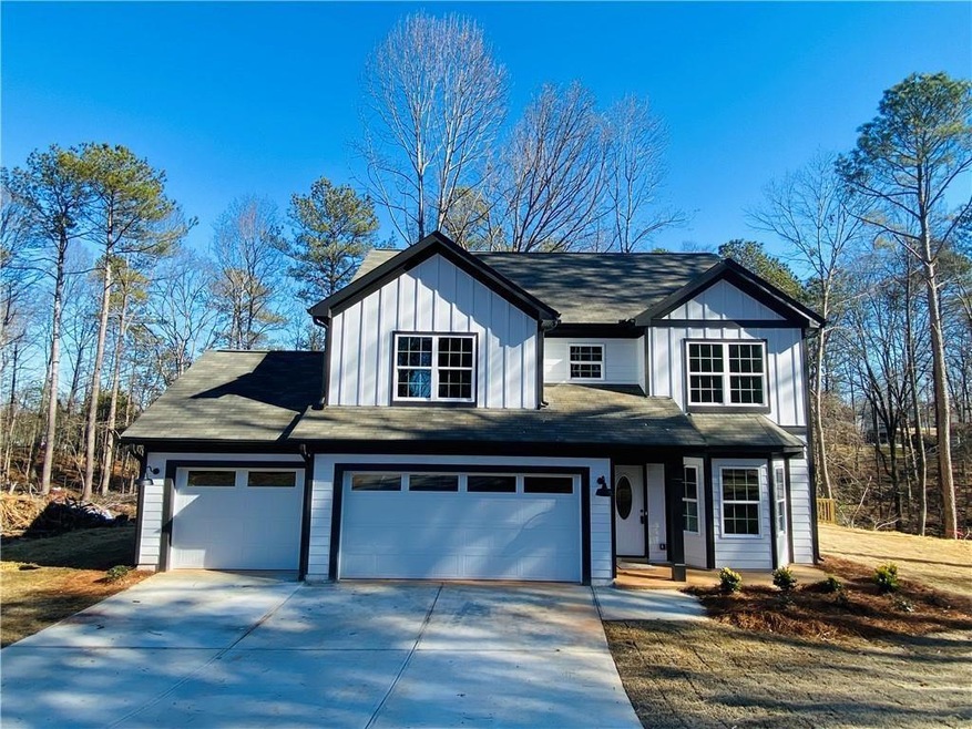 View of front of property with a garage