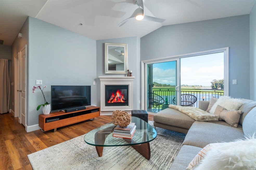 Relaxing living room with high ceiling, modern fan